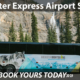 Brewster Express shuttle bus driving on the scenic highway from Calgary Airport to Banff National Park.